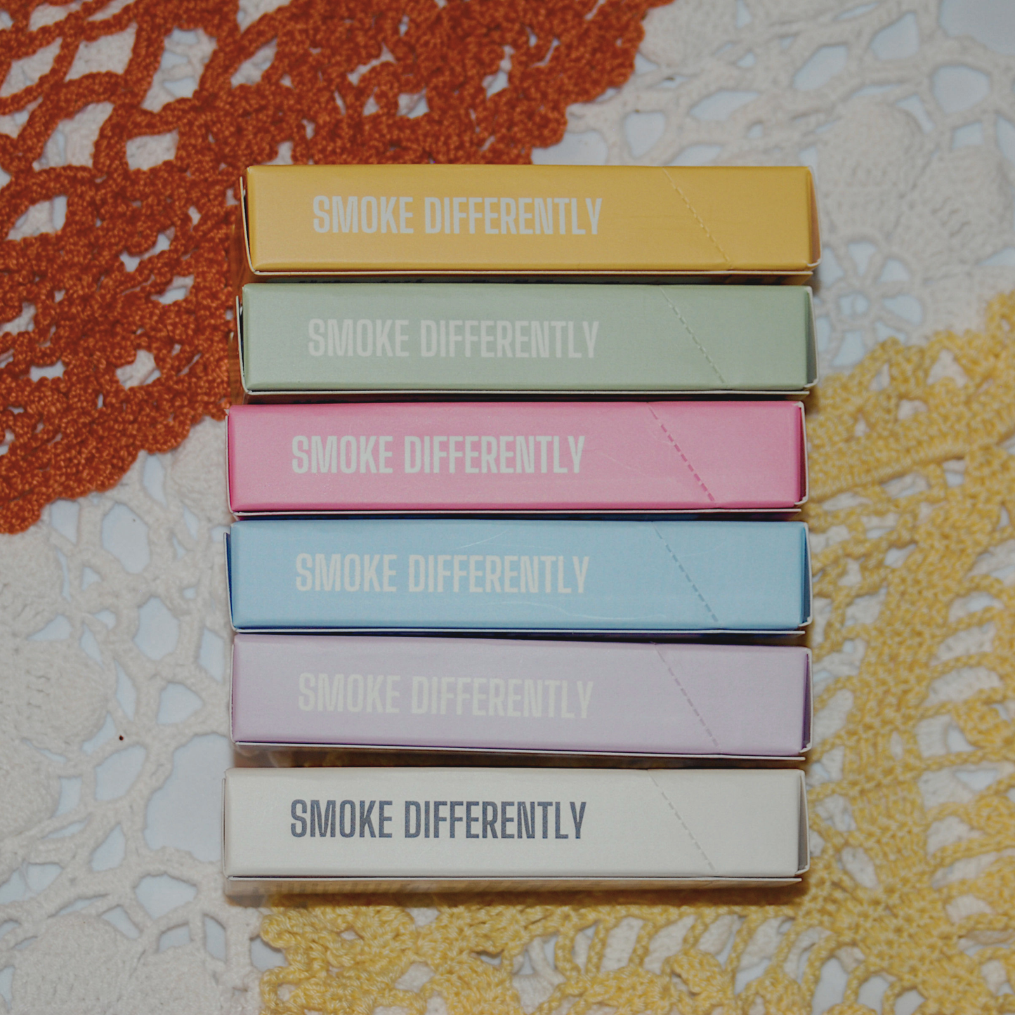 All six Tea Tokes blends showing the Smoke Differently spine